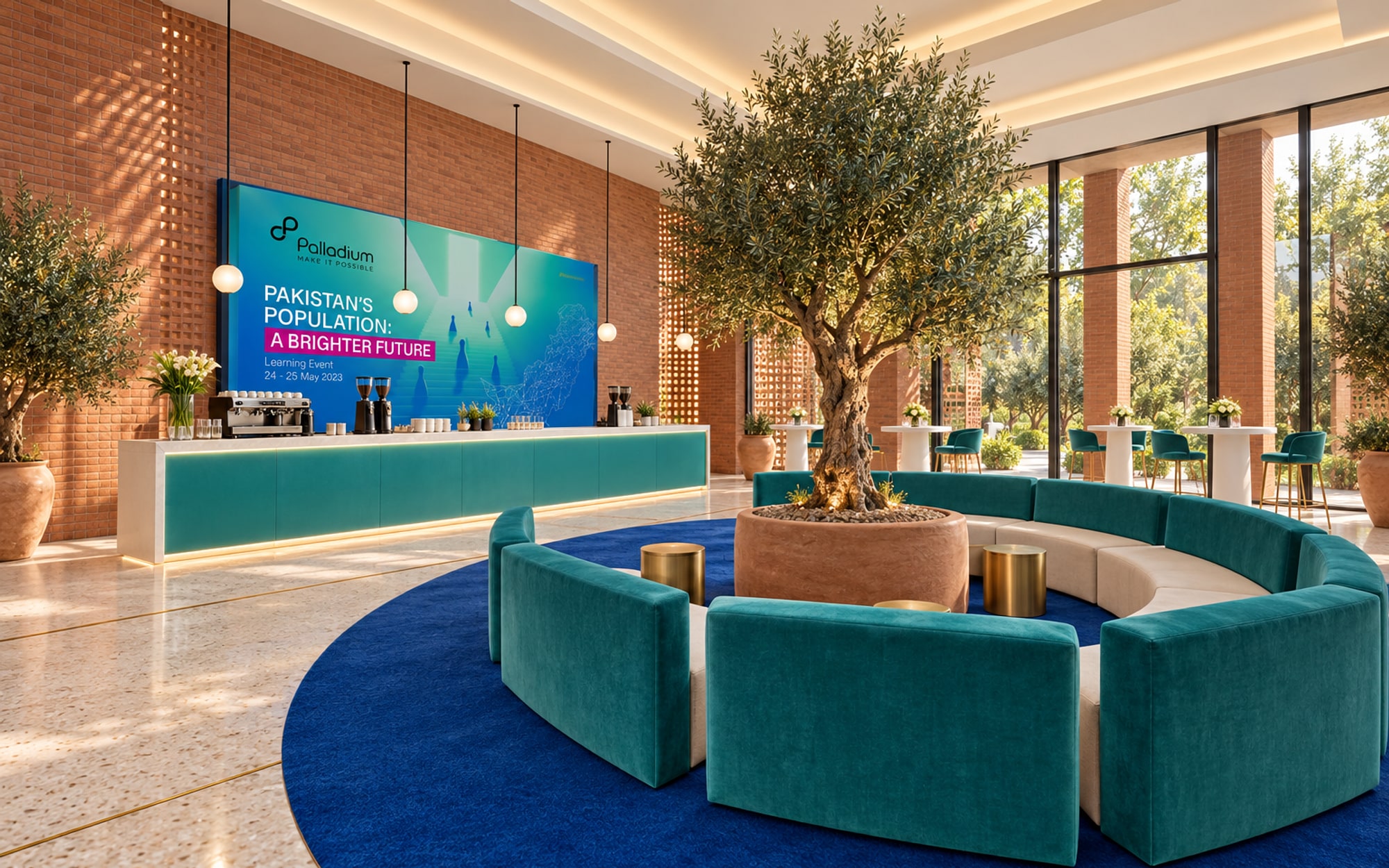 A lounge with a curved teal and ivory banquette around an olive tree on a round blue rug, a white bar with pendant lamps behind it and tall tables by the windows