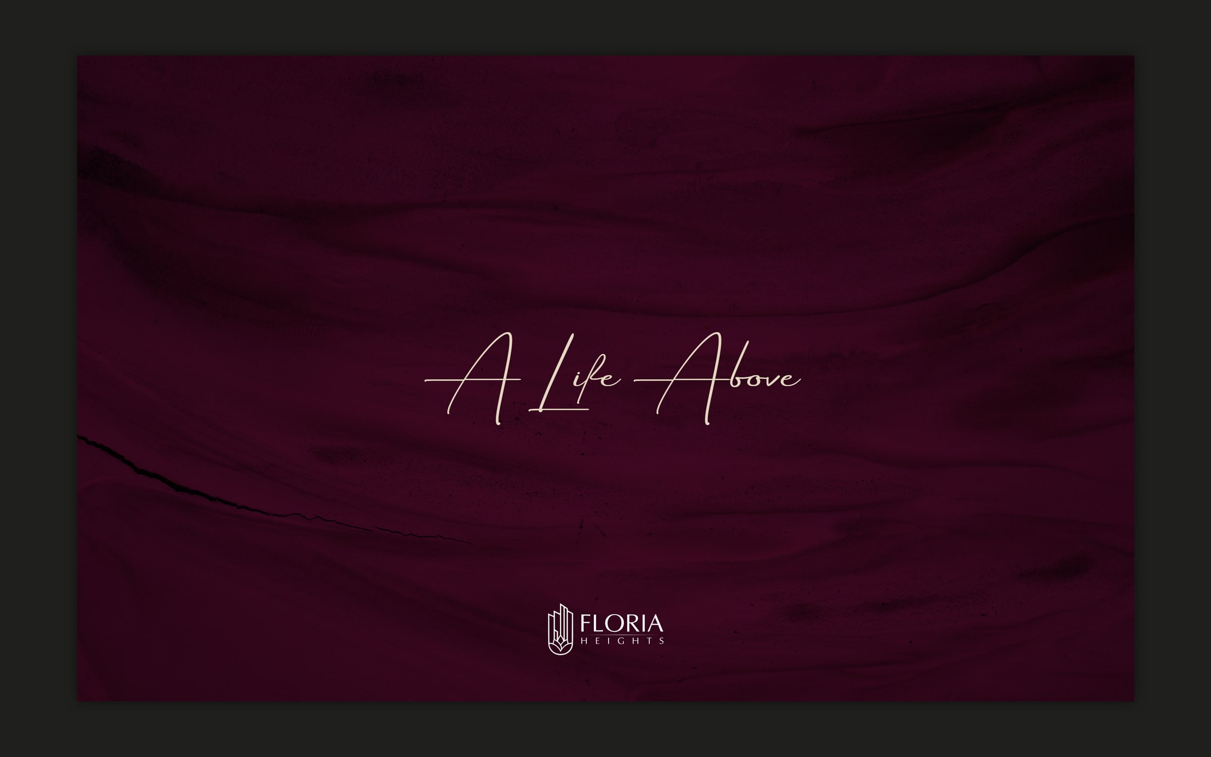 The cover page flat on a dark plate: the words A Life Above in thin script on a wine silk texture, the Floria Heights mark below