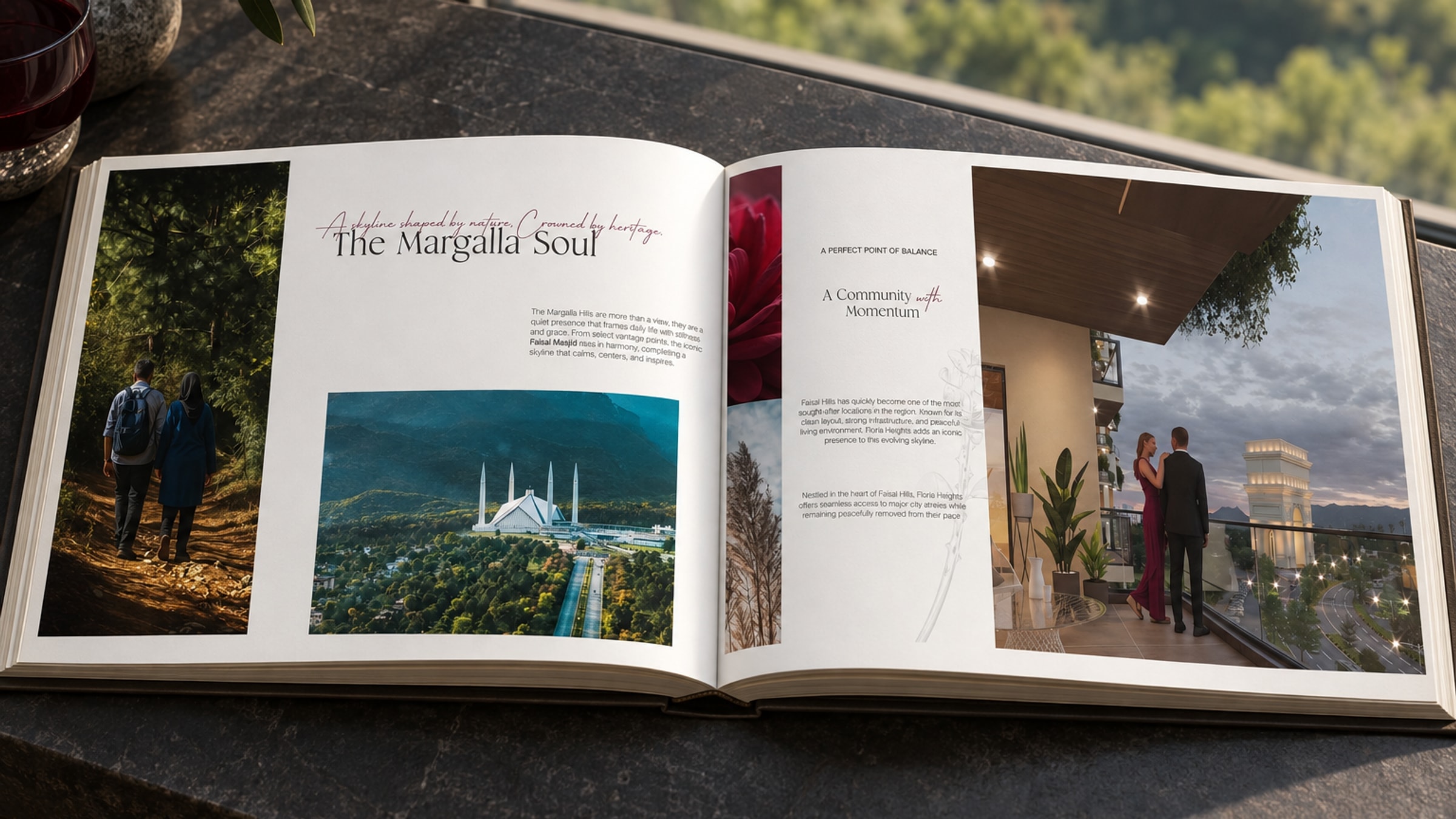 The book open on dark stone by a window: The Margalla Soul spread on the left page, the balcony view on the right