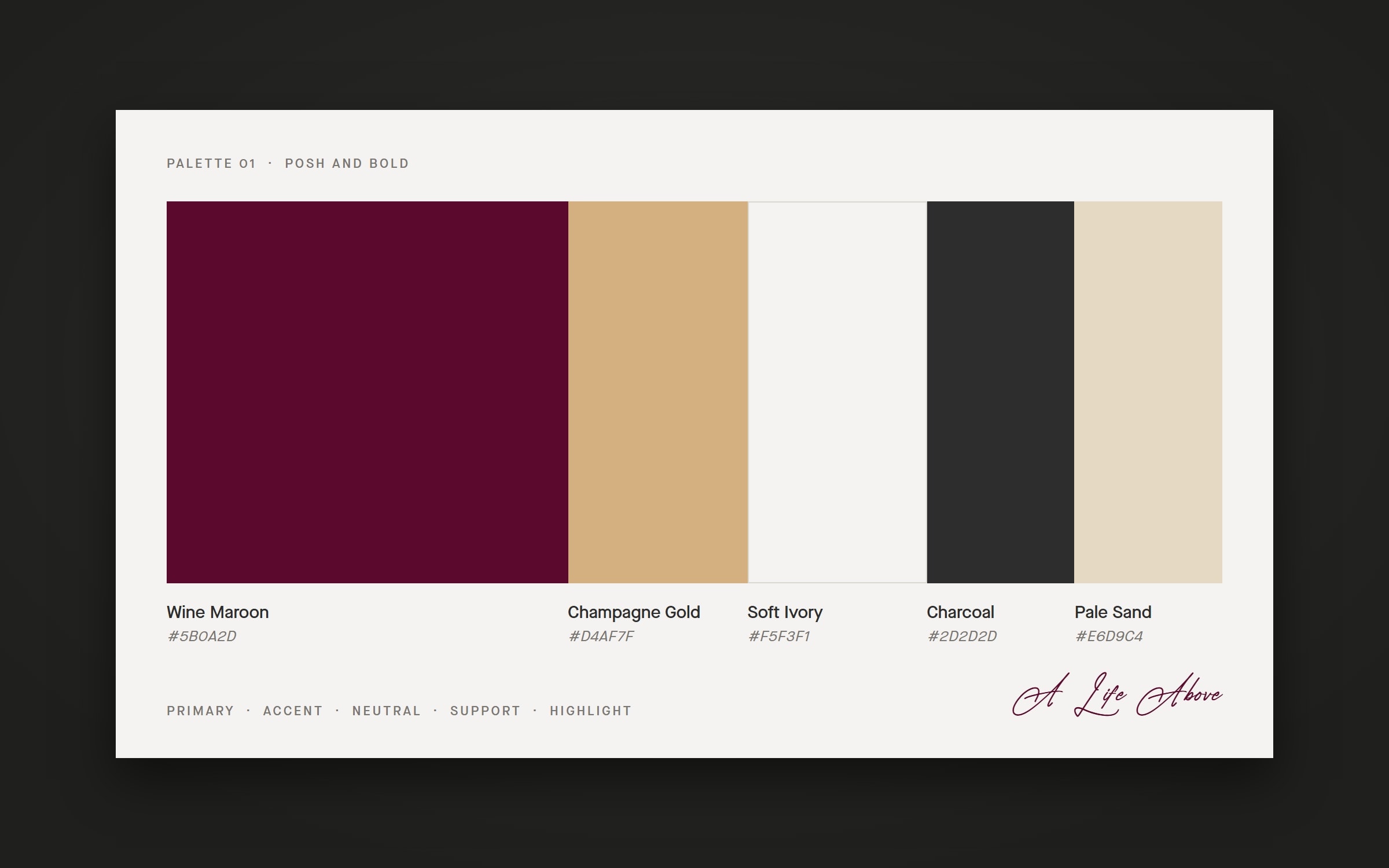 An ivory card on a dark plate with five colour bars and their names and hex values: Wine Maroon, Champagne Gold, Soft Ivory, Charcoal, Pale Sand